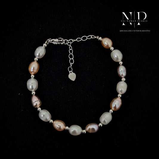 PINK AND WHITE PEARL 925 SILVER BRACELET.